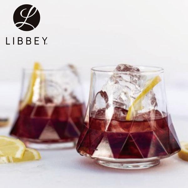 Two Libbey Rock Glass Water glasses (9.8 fl oz), filled with iced drinks and lemon slices, crafted from high-quality glass with a faceted design.