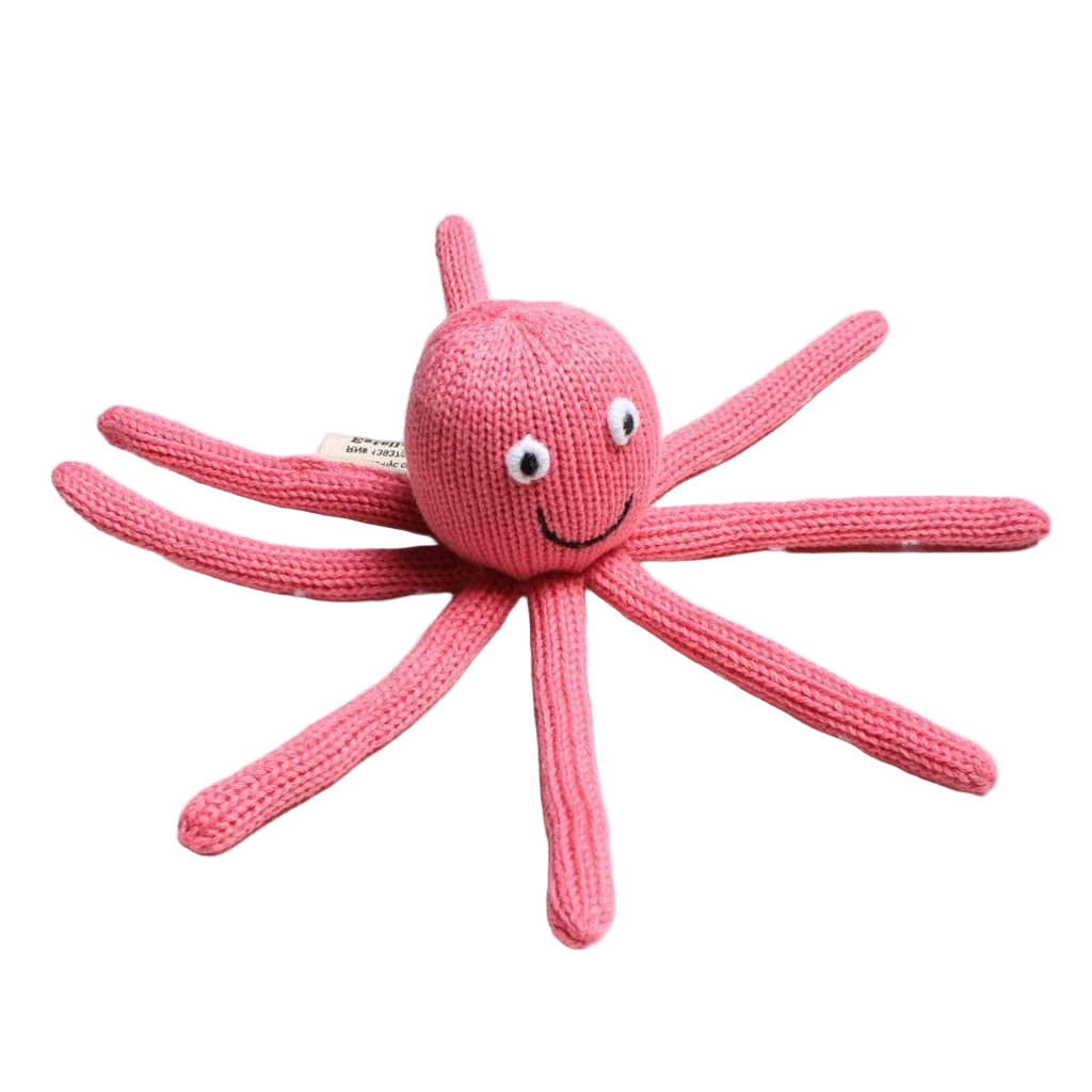 Pink knitted octopus toy on a white background