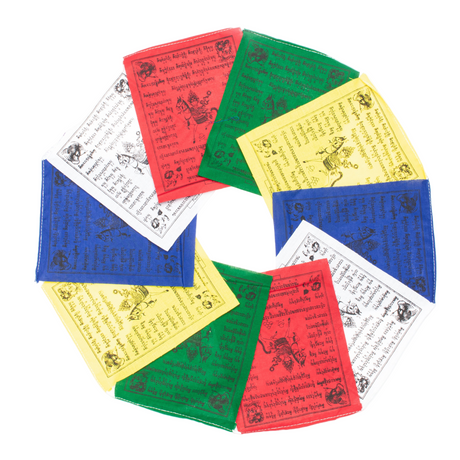 Colorful prayer flag with text and symbols on a white background