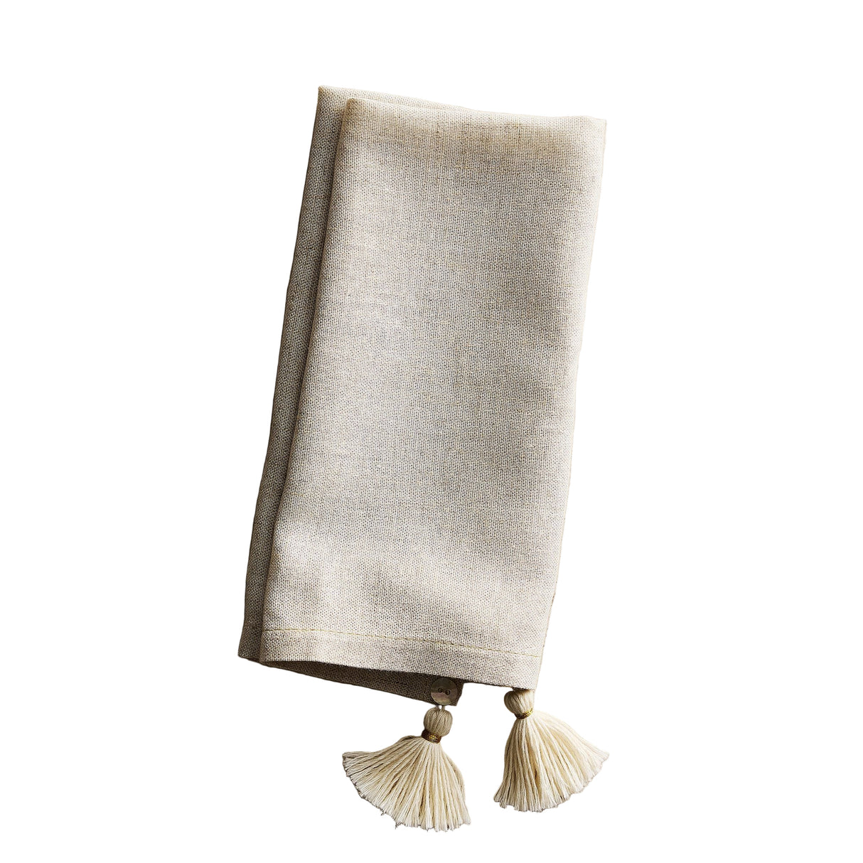 Beige napkin with tassels on a beige background