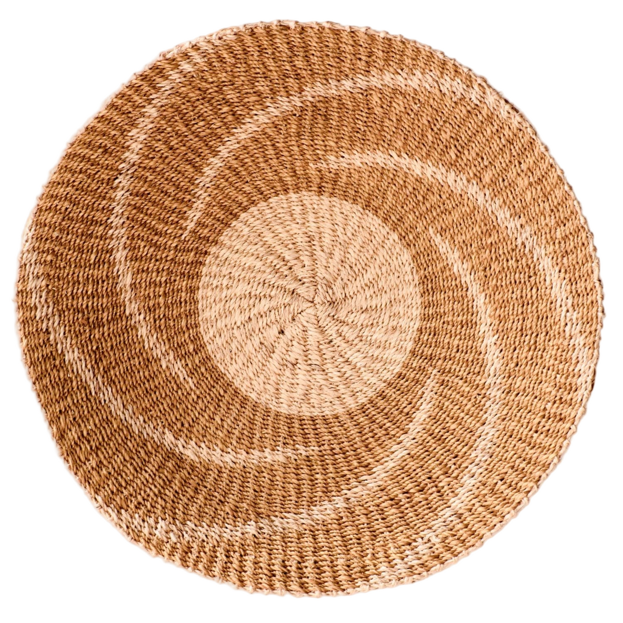Round woven placemat with concentric circle pattern on a white background