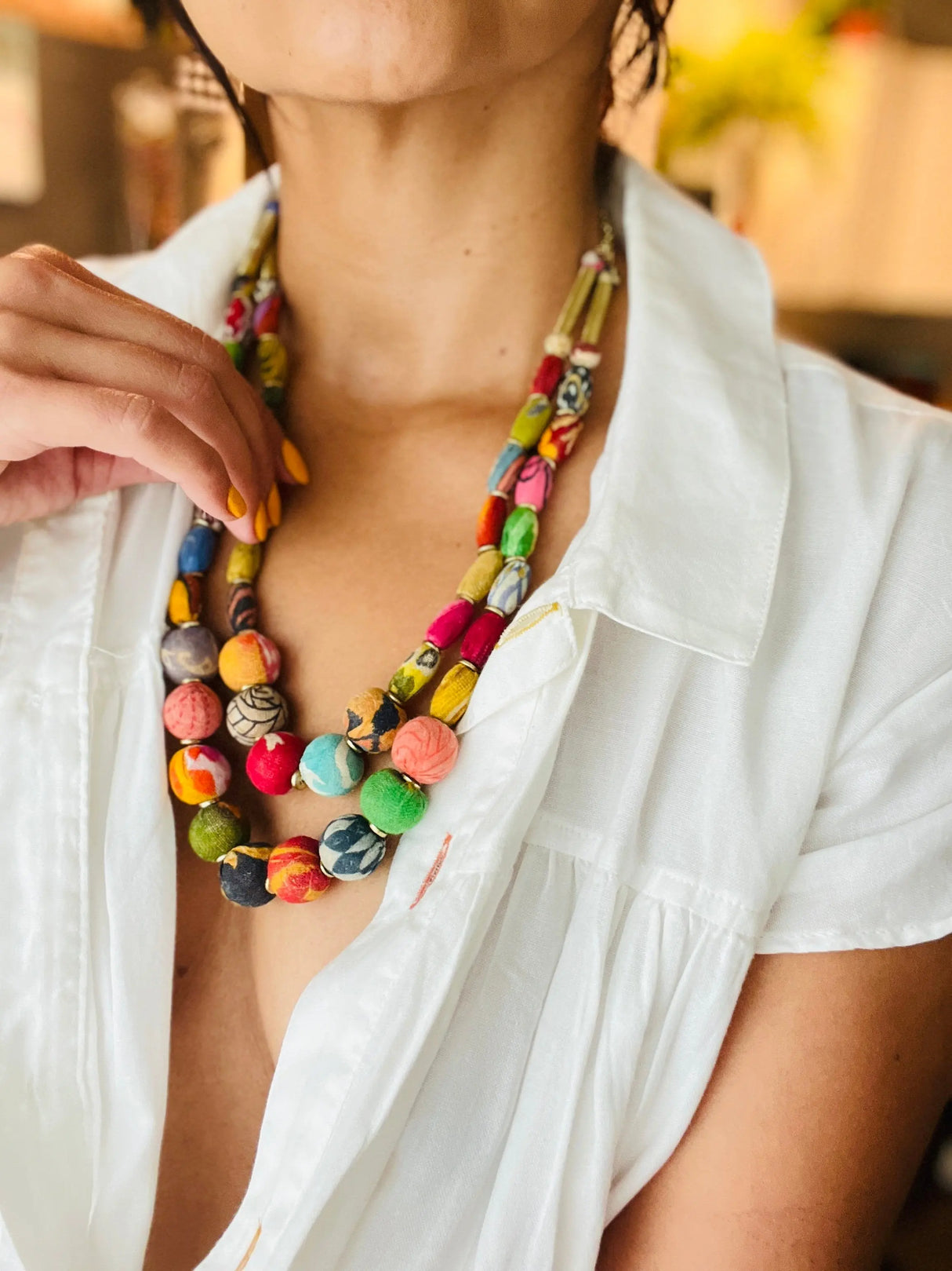 Necklace | Artisan Kantha Jewelry Cylinder Sumiye Co
© 2025 Sumiye Co. All Rights Reserved.
Unauthorized use of photographs is prohibited.