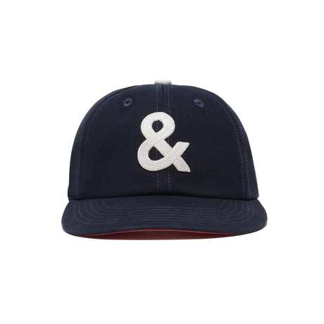 Navy blue cap with a white ampersand symbol on a white background