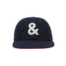 Navy blue cap with a white ampersand symbol on a white background