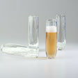Set of clear glass tumblers on a white background