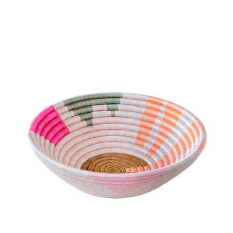 Woven bowl with multicolored pattern on a white background