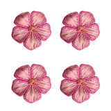 Four pink floral patterns on a white background