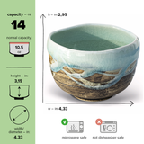 The Japanese Matcha Tea Bowl, Blue & Brown Glaze, is a 14 oz ceramic bowl made with Minoyaki pottery techniques and features an exquisite Japanese blue glaze. Measuring 4.33 inches wide and 2.95 inches high, this microwave-safe piece brings elegance to any tea ritual.