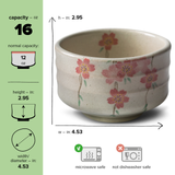 Enhance your kitchen's elegance with the Pink Sakura Flowers Ceramic Matcha Bowl from our Japanese pottery collection. It holds 16 oz, measures 2.95" in height by 4.53" in diameter, and is microwave safe for convenience.