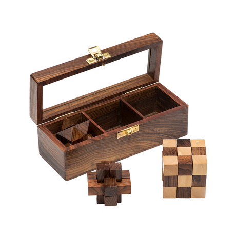 Wooden puzzle box with a wooden puzzle on a white background