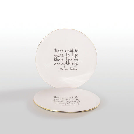 Round ceramic plate with a quote by Maurice Sendak on a white background