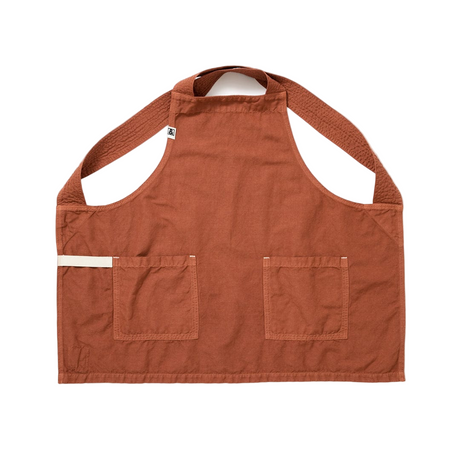 Brown apron with two pockets on a white background