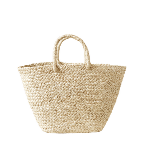 Woven beige tote bag on a white background