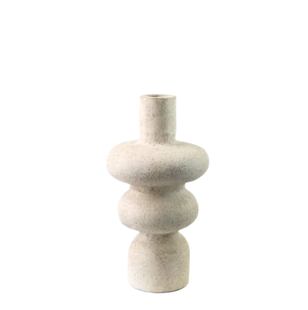 Decorative vase with a textured design on a white background