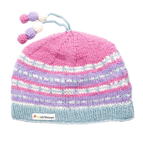 Pink and purple striped knit hat with pom-poms on a white background