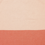 Beige and terracotta color-blocked fabric on a white background
