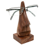 Wooden eyeglass stand shaped like a nose with glasses on a white background