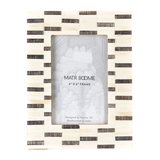 Black and white striped photo frame with 'MATR BOOMIE' branding on a white background