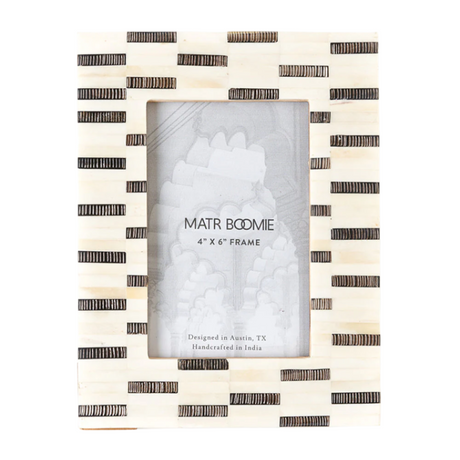 Black and white striped photo frame with 'MATR BOOMIE' branding on a white background