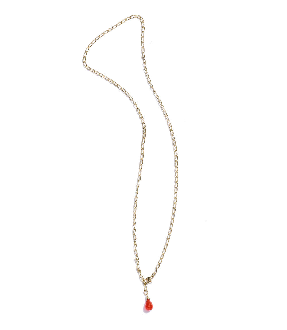Necklace with a red pendant on a white background