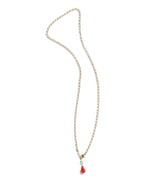 Necklace with a red pendant on a white background