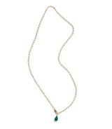 Necklace with a green teardrop pendant on a white background