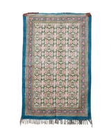 Decorative rug with floral pattern on a white background