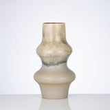 Beige ceramic vase on a white background