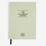 Light green journal with 'The Five Minute Journal' text on a white background