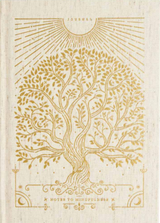 Decorative notebook cover with a gold tree design on a beige background