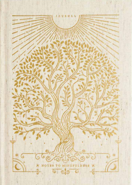 Decorative notebook cover with a gold tree design on a beige background