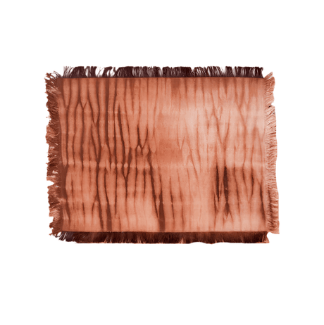 Set of brown placemats with fringes on a white background