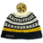 Knitted beanie with black, white, and yellow pattern on a white background