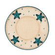 Round woven placemat with starfish designs on a white background