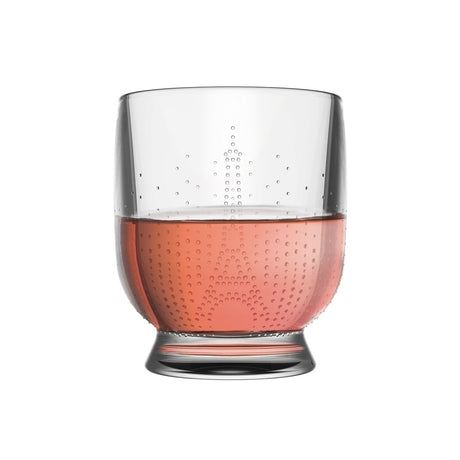 The La Rochere Parisienne Tumbler, filled with a textured pinkish liquid, epitomizes French elegance.