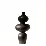 Black and gray ceramic vase on a white background