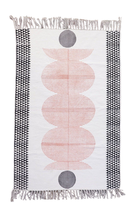 Woven mat with pink circular patterns and black border on a white background