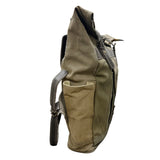 Brown backpack with a shoulder strap on a white background