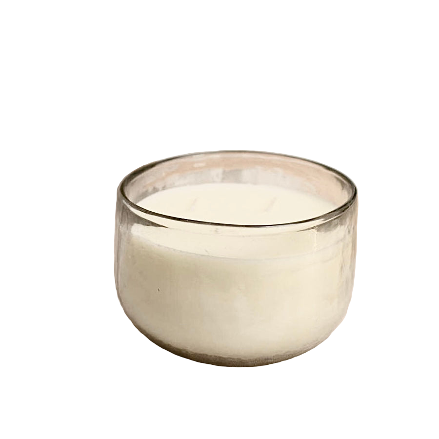 Clear glass candle holder on a white background