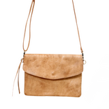 Brown leather crossbody bag on a white background 