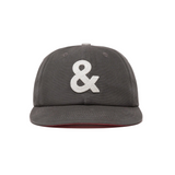 Gray cap with a white ampersand symbol on a white background