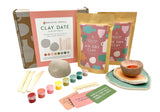 Clay date kit with air dry clay, tools, and coloring options on a white background
