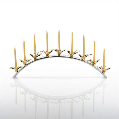 Decorative candle holder with gold birds and candles on a white background