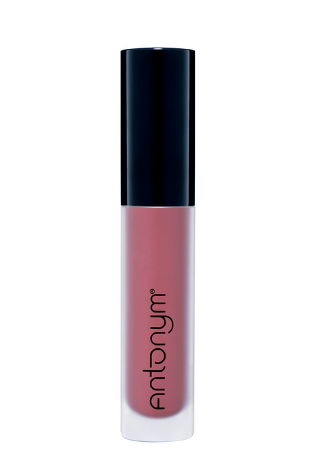 Lip gloss with black cap and visible brand name on a white background