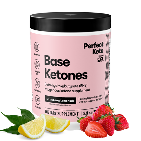 Perfect Keto Base Ketones supplement container with strawberries and lemons on a white background