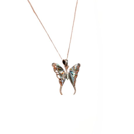 Butterfly-shaped pendant on a thin chain against a white background