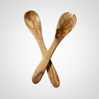 Two wooden spoons on a white background
