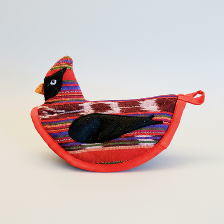 Colorful bird-shaped fabric toy on a white background