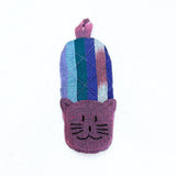 Colorful striped cat-shaped pouch on a white background