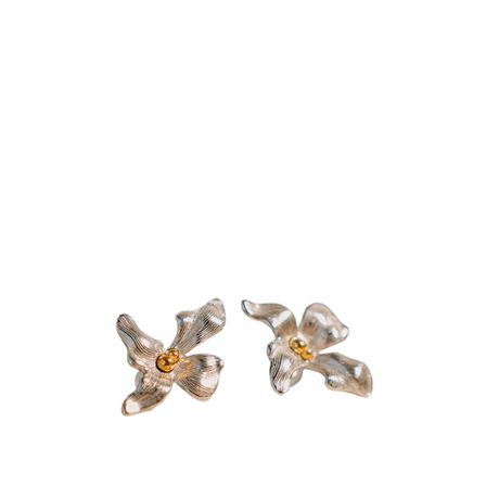 Pair of Orchid-shaped earrings on a white background